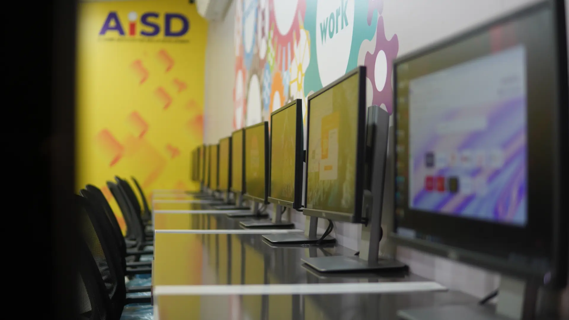 Modern computer workstations for IT students at AISD campus