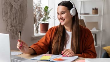Close up of a student working on a coding assignment
